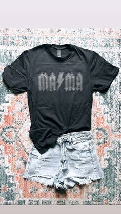 Rocker Mama tee Black on black😍 Adult Unisex sizing Softstyle tee.  For size reference,photo above is a size small. Black Rock T-shirt With Text Print, Black Rock T-shirt With Screen Print, Black Rock Style T-shirt With Relaxed Fit, Black Relaxed Fit Rock T-shirt, Black Rock Style Top With Text Print, Black Cotton Rocker T-shirt, Unisex Black Rock T-shirt, Cricut Tshirt, Boho Rocker