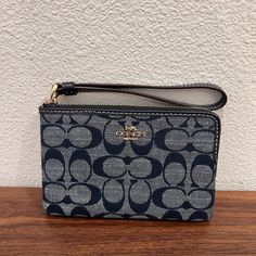 Signature Chambray And Smooth Leather Two Credit Card Slots Zip-Top Closure, Fabric Lining Wrist Strap Attached 6 1/4" (L) X 4" (H) X 1/2" (W) Style No. Ch371 Chic Coach Wristlet With Zipper Closure, Chic Wristlet For Daily Use, Coach Wristlet For Daily Use, Chic Coach Wristlet For Daily Use, Yellow Wallet, Money Purse, Leather Billfold, Gold Wallet, Brown Wallet