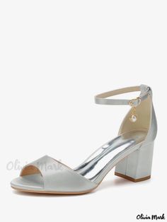 a women's silver high heeled sandal with ankle strap