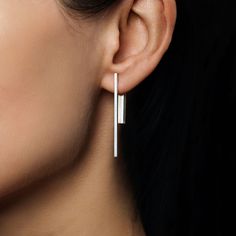 Fore earrings is a minimal design with outstanding simplicity and undeniable style. Double sided, so front and back can be worn separately as well as combined with different ear post. MATERIAL: Silver or 18K Yellow Gold-plated Silver ( please specify when ordering) MEASUREMENTS: Front part- 24 mm Back part- 40 mm Hand made in "aka jewellery" Brooklyn studio. Double Sided Earrings, Jewelry Studio, Design Aesthetic, Single Earring, Gold Plated Silver, Minimal Design, Sustainable Fashion, Earring Set, Silver Plate