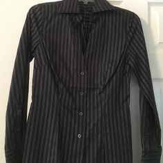 Express Black Dress Shirt In Size Xs With Silver Vertical Stripes Black V-neck Shirt For Formal Occasions, Fitted Black Office Shirt, Fitted Black Shirt For Office, Fitted V-neck Shirt For Business Casual, Black V-neck Shirt For Office Wear, Black Fitted Blouse For Business Casual, Fitted Black Blouse For Business Casual, Fitted Black Blouse For Office Wear, Black Dress Shirt