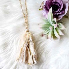 Beautiful and effortless statement style necklace. A mixture of natural colors, lace and vintage charm! This is a long length necklace. Beige Bohemian Long Necklace, Bohemian Long Tassel Necklace With Fringe, Bohemian Long Fringe Tassel Necklace, Bohemian Long Tassel Fringe Necklace, Fringe Long Necklace Gift, Long Fringe Necklaces For Gift, Fringe Long Necklace For Gift, Bohemian Lariat Necklace With Fringe, Bohemian Fringe Lariat Necklace