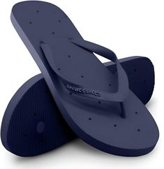 a pair of blue flip flops sitting on top of each other