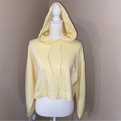 Summer Yellow Pastel Cropped Style Puffy Sleeve Hoodie Sweatshirt Comes In Size Small, Medium, Large, And X-Large 100% Cotton Yellow Hooded Casual Sweater, Casual Yellow Hooded Sweater, Solid Tops With Drawstring Hood For Spring, Trendy Solid Color Tops With Drawstring Hood, Trendy Hooded Top With Drawstring, Cozy Fit Solid Hooded Top, Trendy Solid Top With Drawstring Hood, Cozy Fit Solid Color Top With Drawstring Hood, Cozy Yellow Cotton Tops