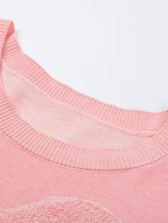 Details: Short sleeve pullover in pink 'Love heart' jacquard three-dimensional pattern Hand embroidered lettering embellishment Ribbed cuffs and hem Classic fit Materials & Care: Cotton 94.5%, Cashmere 5.5% Hand wash | Dry clean Do not bleach Size & Fit: Model is 5'7", Bust 32, Waist 24, Hips 35, wearing a size S Item #: JM2KT01 Pink Ribbed Collar Crew Neck Sweatshirt, Pink Crew Neck Sweatshirt With Ribbed Collar, Pink Cotton Sweater With Ribbed Collar, Pink Crew Neck Sweater With Ribbed Neckline, Pink Ribbed Collar Tops For Loungewear, Pink Tops With Ribbed Collar For Loungewear, Short Sleeve Pullover, Pink Love, Hand Embroidered