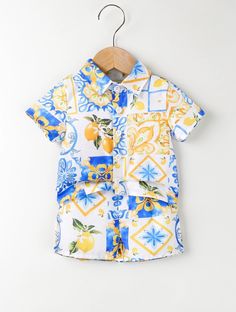 Bring a touch of tropical paradise to your little one's wardrobe with our 2 Pc Baby Boy Lemon Print Resort Shirt and Shorts Set! Crafted with summery vibes in mind, this ensemble features a charming lemon print resort shirt paired with coordinating shorts for a fun and stylish look. Made from soft and breathable fabric, it ensures comfort and ease for your little explorer during warm-weather adventures. Whether it's a beach day or a family vacation, this set is perfect for keeping him cool and f Lemon Shirt, Shirt And Shorts Set, Resort Shirt, Striped Bodysuit, Shirt And Shorts, Lemon Print, Girls Stripes, Be A Nice Human, Summer Baby