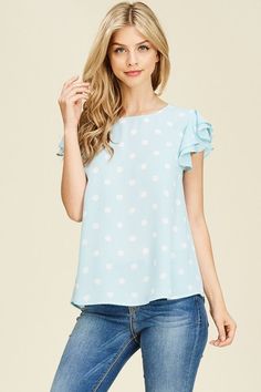 Super cute ruffled sleeve polka dot top! Pair with slacks and heels for work or white jeans and sandals for a summer outfit! Shop now! Summer Sleepwear, Light Blue Top, Cozy Tops, Top For Summer, Stunning Outfits