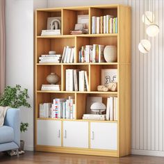 a living room with a blue chair and bookshelf