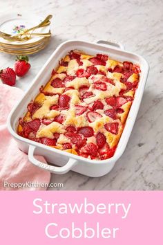 strawberry cobbler recipe in a white casserole dish