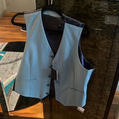 Brand New. Light Blue In Front And Darker Blue In Back. Size : 46 Inch Waist. Elegant Blue Sleeveless Outerwear, Elegant Sleeveless Blue Outerwear, Blue Fitted Vest For Fall, Tailored Blue Vest For Fall, Fitted Blue Vest For Workwear, Blue Business Vest With Pockets, Blue Fitted Vest For Work, Formal Blue Vest For Spring, Formal Blue Vest