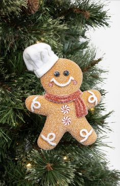 a ginger ornament hanging from a christmas tree