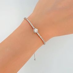 This luxurious 14K white gold ladies' bracelet is crafted with 0.75ctw. of shimmering diamonds set in a Bolo adjustable design. The 0.75ctw. G/H color SI/SI2 diamond stones measure 4.15mm each, and the adjustable design ensures a perfect fit on most wrists, from 7" to 8" in length. With a total weight of 5.0gm, this bracelet is a stunning way to add a touch of sparkle to your evening wear.Thank you for visiting our shop!Visit our website DmKJewelry.comAlso Follow us on Instagram https://www.inst Ladies Bracelet, Diamond Jewellery, G H, Diamond Stone, Adjustable Bracelet, Evening Wear, Womens Bracelets, Diamond Jewelry, Perfect Fit