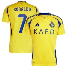 a yellow soccer jersey with the number seven on it and blue trimmings is worn by ronaldo