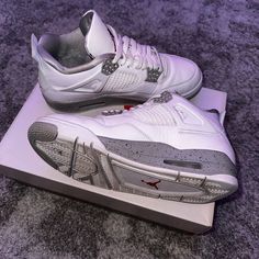 The Shoes Are Grey And White With Black Speckles. They Are Used But Still In Very Good Condition. It Comes With The Original Box And The Wrapping Within The Box. They Are A Size 8 In Men’s But Women Can Wear Too! Air Jordan 4 Retro, Jordans For Men, Jordan Shoes, Mens Shoes Sneakers, Grey And White, Air Jordans, Shoes Sneakers, Men's Shoes, Man Shop