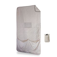 an image of a white cover on the back of a garment rack with a bag next to it