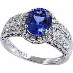 14K White Gold Oval Tanzanite and Diamond Halo Ring - 1.66 Carat Tanzanite, 0.49 Carat Diamond Total Weight Dazzling Oval Gia Certified Rings, Oval Brilliant Cut Sapphire Ring, Luxury Oval Tanzanite Diamond Ring, Dazzling Oval Sapphire Ring With Brilliant Cut, Elegant Oval Tanzanite Rings, Dazzling Oval Sapphire Diamond Ring, Gia Certified Elegant Oval Cabochon Jewelry, Elegant Oval Tanzanite Jewelry, Oval Sapphire Ring With Center Stone