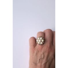 This is part of Chairish’s Fine Jewelry assortment.  A beautiful, white cultured pearl and 14-karat yellow gold cluster cocktail ring, circa mid-20th century, 1960s, Europe. Ring's cluster is the size of a nickel. Cluster has 7 cultured pearls and 6 small pearls around, all in a beautiful 14-karat yellow gold setting. Ring is marked inside 'K14' as shown in last image. Ring size is a 6. Ring can be sized up or down by a professional jeweler. A beautiful ring to wear every day or for dressy occas Vintage White Pearl Ring, Vintage White Cluster Jewelry, Vintage Pearl Ring For Formal Occasions, Vintage Pearl Ring As Gift, Vintage Pearl Rings As Gift, Yellow Gold Cocktail Ring, Yellow Gold Setting, Beautiful Ring, Cocktail Ring