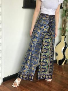 Blue Bohemian Full Length Pants, Bohemian Style Full Length Blue Pants, Blue Bohemian Wide Leg Pants For Vacation, Bohemian Blue Wide Leg Pants, Bohemian Blue Wide Leg Pants For Beach, Bohemian Full-length Blue Harem Pants, Hippie Blue Harem Pants, Blue Beach Harem Pants, Blue Harem Pants For Beach