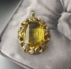 This listing is for a genuine 1930s vintage German citrine pendant, beautiful Art Deco design, very nicely done, in good used condition, measures approx. 27 x 32 mm. Nice genuine old piece with wear! Pendant measures approx. 27 x 32 mm. Total weight (with chain): 6.8 g Material: 835 silver, citrine Box on photos is NOT included! Antique Yellow Jewelry Collectible, Antique Yellow Pendant Jewelry, Antique Yellow Collectible Jewelry, Art Deco Citrine Gold Jewelry, Yellow Victorian Jewelry For Formal Occasions, Vintage Yellow Pendant Jewelry, Vintage Yellow Jewelry As Gift, Vintage Yellow Jewelry For Gifts, Vintage Yellow Jewelry Gift