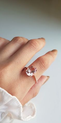 RING DETAILS: ✪Design: Gold ring ✪Gemstone: AA Morganite ✪Gemstone color: Pink ✪Gemstone shape: Oval ✪Gemstone transparency: Transparent ✪Gemstone size: Morganite- 9X11mm ✪Gemstone weight: Morganite- 3 carat ✪Setting type: Prong setting ✪Metal type: 14k rose solid gold ✪Gold weight: 2.13 gm ✪Metal finish: Smooth shiny Choose your ring size from drop down menu and if you need any other preferred ring size please contact us. QUALITY OF MATERIALS: Metal: Most of our jewelry at JewelryMansion is mad Rose Gold Oval Morganite Topaz Ring, Eco-friendly Morganite Diamond Ring, Oval Morganite Jewelry For Proposal, Morganite Rings With Prong Setting For Proposal, Morganite Ring With Prong Setting For Proposal, Morganite Oval Rings With Brilliant Cut, Solitaire Morganite Oval Ring, Classic Oval Morganite Ring, Oval Morganite Solitaire Ring