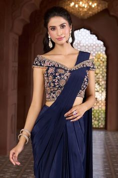 Navy blue pre-draped saree. Comes with floral and geometric embroidered off-shoulder blouse. - Aza Fashions Draped Saree, Drape Saree, Saree With Blouse, Embroidered Blouse, Aza Fashion, Off Shoulder Blouse, Blue Floral, Hand Embroidered, Off Shoulder