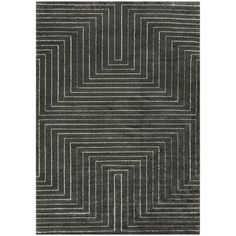 an area rug with black and white lines on it, in the shape of squares