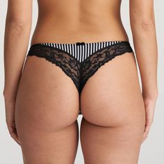 Marie Jo Sydny's lace thong with stripes adds the finishing touch to your tuxedo look. Tuxedo Black is a timeless black color that goes with all styles and looks, from business to casual to sexy. Style# 060-2720 Style: Thong Fabric: 69% Polyamide, 16% Elastane, 9% Polyester, 6% Cotton. Design: This sexy thong shows off your bottom, is cut lower at the front, and makes your legs appear longer. Contrasting colors, luxurious details, and a high back: Marie Jo Syndny captivates with a bold design and an incredible fit. Treat yourself to subtly visible lingerie that is totally on-trend. Fit and Tips: True to size. Tuxedo Black, Lace Thong, Contrasting Colors, Black Color, Stripes, Lingerie, The Incredibles, Lace, Black