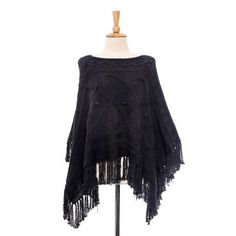 Knit from 100% cotton in a solid onyx hue this charming poncho is created by artisan duo Ying and Joy in Thailand. Elaborate patterns decorate the chest while cable-knit designs accentuate the top and bottom of this piece completed with a dainty fringe. Black Knitted Poncho One Size, One Size Knit Poncho With Fringe, Black Knitted One-size Poncho, Black Bohemian Poncho One Size, Black Knit One-size Poncho, One Size Knit Poncho Shawl, One-size Knit Shawl Poncho, Hand Knitted One Size Poncho, Black Bohemian Crochet Poncho