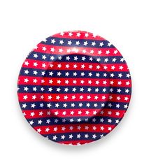 a red, white and blue plate with stars on the side in front of a white background