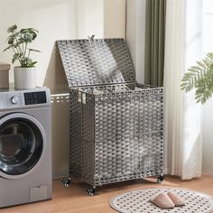 a laundry basket sitting next to a washing machine