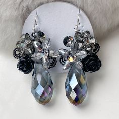 Black crystal floral dangle earrings. Thank you for visiting PastelGems Party Flower Crystal Earrings, Crystal Flower Earrings For Party, Black Crystal Earrings As Gift, Crystal Flower Drop Earrings For Gift, Crystal Drop Flower Earrings For Gift, Crystal Drop Earrings For Gift, Black Drop Crystal Earrings, Black Crystal Drop Earrings, Handmade Gifts For Women