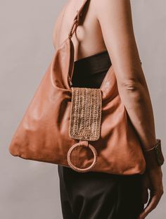 Elevate your style with this Chic Bohemian hobo bag. Made of genuine goat leather, it's perfect for any occasion. Features a wide shoulder strap and beaded flap closure. Stay organized with interior slip and zipper pockets. Don't forget to pair it with our beaded shoes for a charming look! -Measurements: Bottom length 39cm, height 37cm-Measurements (inch): length 15.3", height 10.5"-Shoulder drop 33cm (13")-Zip closure / flap-Inside zip pocket & open pocket-Matching cotton drill lining Bohemian Style Bag, Beaded Shoes, Large Leather Bag, Bohemian Skirt, Soft Leather Bag, Night Day, Bohemian Bags, Chic Bohemian, Hippie Bags