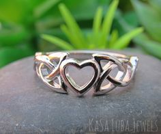 Celtic heart Sterling silver ring sizes 4-11 SOLID sterling stamped 925 silver Tarnish free *IF YOUR SIZE ISNT SHOWING, MESSAGE ME. I might be sold out and will be able to replenish shortly* Top of ring height: 7.5mm Band width: 2.4mm / Shank width: 2.4mm Solid 925 sterling with Rhodium plating to stop tarnishing Nothing but the best from my custom jewelry store. ] Email me if you have any questions. Celtic Heart, Vero Beach Fl, Spiritual Love, Vero Beach, Ring Sizes, Ring Sterling Silver, Jewelry Store, Sterling Ring, Rings Statement