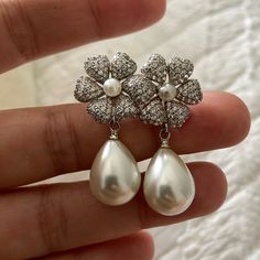 I Purchased These Earrings From Anthropologie Store In Nyc In 2017. I Never Worn Them. They Are Beautiful Simple And Classy. Perfect New Condition. Pierced White Classic Flower Earrings For Pierced Ears, White Teardrop Pearl Earrings For Party, Classic White Flower Earrings For Pierced Ears, White Classic Flower Earrings, Classic White Flower Earrings, Classic White Flower Earrings For Wedding, Classic White Flower Wedding Earrings, Elegant White Teardrop Flower Earrings, White Pearl Drop Flower Earrings For Party