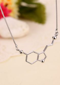 Feeling down? You need more serotonin! Luckily, we have this beautiful necklace with the chemical formula to brighten up your day and bring some happiness to your hormones Silver Necklace Outfit, Serotonin Necklace, Serotonin Molecule, Dolphin Jewelry, Geometric Pendant Necklace, Mountain Necklace, Chemical Formula, Fashion Pendant, Bear Necklace