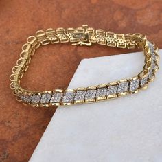 Estate/ vintage 14KT yellow gold diamond mesh, soft bangle link bracelet. Detailed double yellow gold diamond links design with pave diamond stations set in 14KT white gold. 7.5" Length Width: 7mm Weight: 17.40 Grams Push In, Box Style Clasp w/figure 8 Security Safety Latch Approx. 2.50-3.00 carat diamonds I Clarity; J/K color Hallmarked/Stamped 14KT ITALY Yellow Gold Diamond Bracelet With Pavé Setting For Anniversary, Yellow Gold Diamond Bracelet With Pave Setting For Anniversary, Anniversary Chain Bracelet With Diamond Accents, Yellow Gold Chain Bracelet With Diamond Accents For Anniversary, Fine Jewelry Gold Bracelet With Pave Setting For Anniversary, Gold Bracelet With Pave Setting For Anniversary, Anniversary Diamond Bracelet With Pave Setting, Anniversary Gold Bracelet With Pave Setting, Gold Diamond Tennis Bracelet With Pave Setting