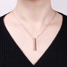 The long, vertical pendant that gives this necklace its chic, elegant appearance is embellished with the engraving of your choice. You can have it engraved just on a single side, or you can have all four sides personalized.Chain Type: Cable chainMaterial: 925 SilverPlating Color: Silver, Yellow Gold, Rose Gold Elegant Engraved Necklace With Rectangular Pendant, Elegant Stainless Steel Necklace With Rectangular Pendant, Elegant Bar Necklace With Rectangular Pendant For Personalized Gift, Elegant Personalized Necklace With Rectangular Pendant, Elegant Rectangular Pendant Bar Necklace For Personalized Gift, Elegant Personalized Bar Necklace With Rectangular Pendant, Elegant Rectangular Bar Necklace As Personalized Gift, Elegant Rectangular Pendant Necklace For Memorial, Elegant Rectangular Pendant Necklace For Mother's Day