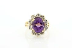 This Interesting ring is made in  800 Silver and is hallmarked on the exterior of the band. In the center is a Oval cut Amethyst and has chip/shard of diamonds for a halo. The head of the ring measures 17.85mm long, 15.18mm wide, and sits 9.49mm tall. The ring is a size 6.5.--Please reference our policy for more details--***For International orders, please provide a phone number for shipping purposes. Just place a note in the comment box during check out.Thank you.** Classic Diamond Multi-stone Amethyst Ring, Vintage Purple Diamond Ring, Sapphire Band, Ring With Diamond, Rings Cool, Amethyst Ring, Oval Cut, Phone Number, Sapphire Ring