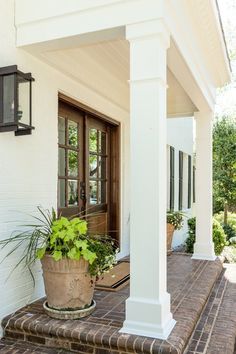 entryway with custom columns Outdoor Wood Columns Porch Posts, Farmhouse Columns Interior, Porch Column Design, Craftsman Posts Columns, Column Design Exterior Entrance, Outdoor Patio Column Ideas, Exterior Posts Columns, Front House Pillars, Thick Porch Columns