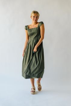 This playful, quirky dress exudes confidence with its ruffle sleeves and flattering midi length. Perfect for adding some fun to your everyday wardrobe, its olive color adds a touch of personality to any outfit. Get ready to turn heads and feel fabulous in the Whitmire Ruffle Sleeve Midi Dress! self/lining: 100% cotton Fabric Care Guide Here Sizing & Fit Measurements are approximate and taken while laying flat across the front. Not doubled. x-small: bust = 14.5"; waist = 13"; length = 48" small: Quirky Dress, Half Zip Sweaters, Olive Color, Midi Dress With Sleeves, Ruffle Sleeves, Denim Jumpsuit, Wide Leg Denim, Zip Sweater, Everyday Wardrobe