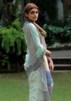 This uniquely woven multi-colored stripe scarf, woven from a fine silk and wool blend, features a contrasting mousse floral lace border. This perfect any time wear accessory is a must-have in every woman's wardrobe. Spring Multicolor Dupatta With Printed Border, Elegant Multicolor Cotton Dupatta, Elegant Multicolor Cotton Silk Dupatta, Stripe Scarf, Striped Scarves, Lace Border, Women's Wardrobe, Color Stripes, Silk Scarf