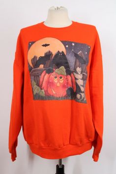 --Vintage '90s orange Halloween-themed sweatshirt with print by Mary Helen Gould. --Jerzees sweatshirt. --Size Large. Measurements (lying flat): Bust (pit to pit): 23" Shoulder to shoulder: 24" Sleeve (shoulder seam to cuff): 23" Length (back of neck to hem): 25.5" Vintage Halloween Sweatshirt For Streetwear, Vintage Halloween Long Sleeve Sweatshirt, Vintage Long Sleeve Halloween Sweatshirt, 90s Graphic Print Fall Sweatshirt, Oversized Fall Sweatshirt With Character Print, 90s Letter Print Sweater For Fall, 90s Letter Print Fall Sweater, Halloween Costume Ideas Easy, Orange Halloween Shirts