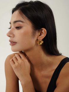 Dazzle in these Gold Abstract Earrings, perfect for making a statement. With their chunky and unique gold irregular stud design, they're a blend of modern elegance and flair. Chunky Gold Metal Earrings, Chic Gold Hammered Earrings, Hammered Hoop Earrings For Party, Chic Gold-plated Earrings, Chic Hammered Metal Earrings, Gold Chunky Earrings As Gift, Gold Chunky Earrings For Gift, Elegant Chunky Hoop Earrings As Gift, Elegant Chunky Hoop Earrings For Gift