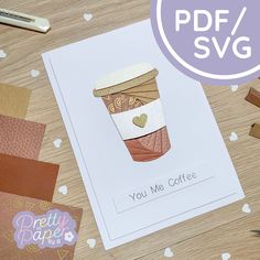 a card with a coffee cup cut out on it next to some crafting supplies