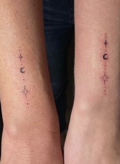 two people with matching tattoos on their arms