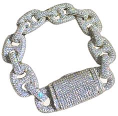 Luxury White Bling Bracelets, Luxury White Bracelets With Bling, Luxury Sparkling Diamond White Jewelry, Luxury Sparkling Crystal Jewelry, Luxury Sparkling White Gold Jewelry, Dazzling Iced Out White Gold Jewelry, Dazzling Iced Out Silver Jewelry, Dazzling Silver Iced Out Jewelry, Luxury White Gold Bracelets With Rhinestones