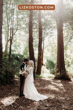 a bride and groom standing in the woods for their wedding photo session at lizkoston com