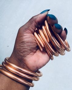 COPPER BANGLES // 100% COPPER // SLIGHTLY ADJUSTABLE // ONE SIZE FITS ALL // 2PC OR 4PC SET Our Modern designed Copper Bangles is one of Vinti Couture's sataple pieces! These Copper Bangles are cut & dessigned by Vinti Couture. Banlges are 100% lightweight, hollow unsealed cooper. Bangles may require seldom cleaning & should be cleaned w/ liquid Brasso (for Copper) to keep bangles polished when needed. **Please see Delivery & Processing Times: Our Pieces are 100% Beautifully Handcrafted by the o Copper Bangles, West Indian Bangles, Copper Choker, Dope Jewelry Accessories, Stackable Bangles, The Bangles, Bangles Set, Bangles Indian, Bangle Bracelet Set