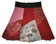 two skirts with mickey mouse and minnie mouse on them