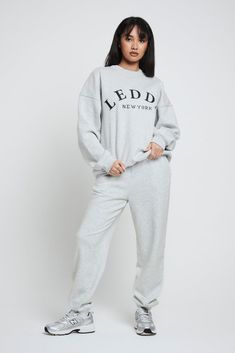 The LEDDA Oversized Varsity Sweatshirt is an ideal addition to any loungewear rotation. 420GSM organic brushback cotton polyester blend gives a soft-touch, cozy feel, with premium neckline, cuff and hem ribs providing a boxy, oversized fit. Embroidered LEDDA branding on the front chest allows you to wear this piece with pride. This product has an oversized fit as standard. Size down if you prefer a closer fit. Varsity Sweatshirt, Grey Sweatshirt, Oversized Fits, Lounge Wear, Shop Now, Cuff, Branding, Sweatshirts, Grey